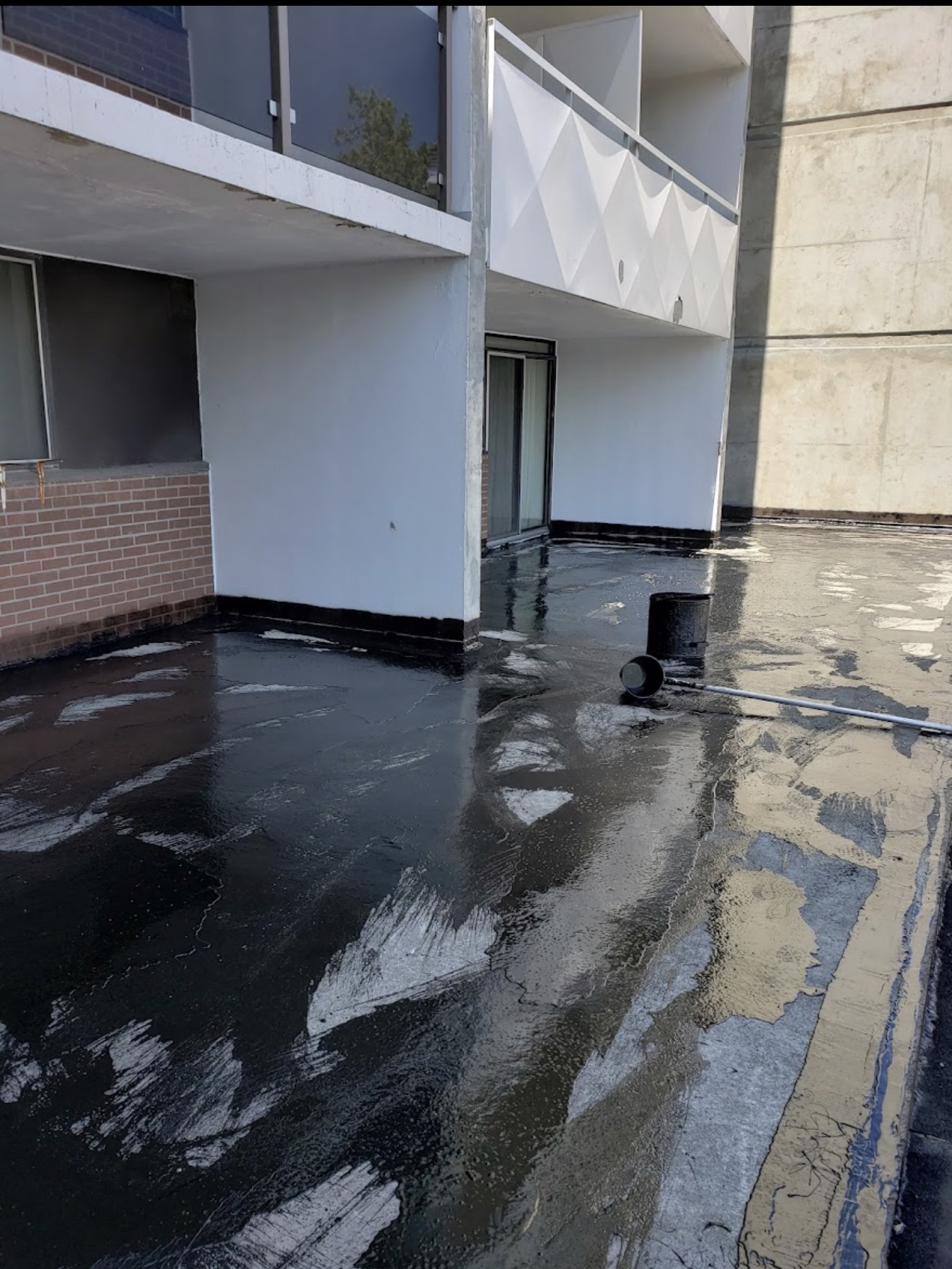 Flat Roof Hot Tar Application